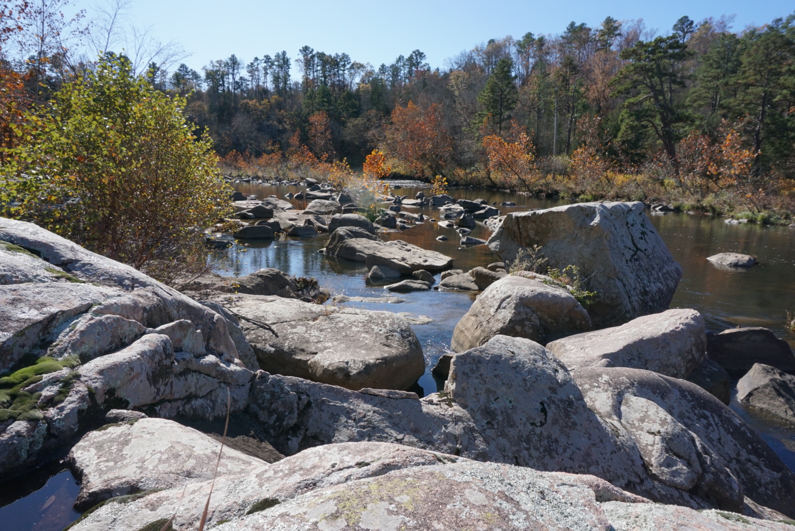 Granite boulders among the fall colors on the St. Francis River